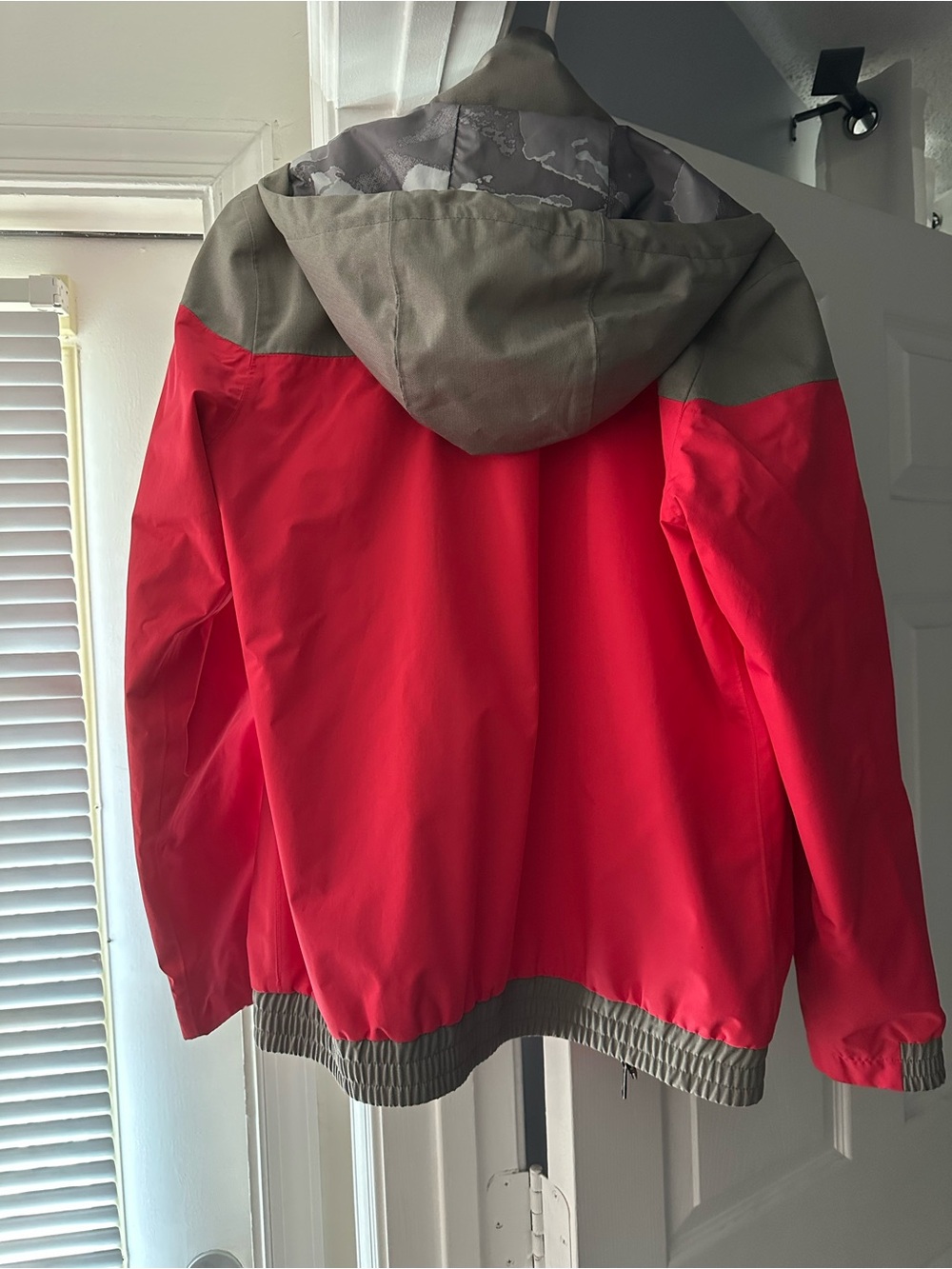 The North Face Pink and Gray Hooded Rain Jacket